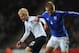 MILTON KEYNES, ENGLAND - NOVEMBER 14: Will Hughes of England is challenged by Dani Hatakka of Finland during the 2015 UEFA European Under 21 Championships Qualifier Group 1 match between England and Finland at StadiumMK on November 14, 2013 in Milton Key