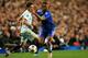 LONDON, ENGLAND - DECEMBER 11: Ashley Cole of Chelsea goes past Nicolae Stanciu of Steaua during the UEFA Champions League Group E match between Chelsea and FC Steaua Bucuresti at Stamford Bridge on December 11, 2013 in London, England. (Photo by Richar