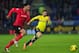 CARDIFF, WALES - DECEMBER 28: Sunderland forward Fabio Borini (right) chases a ball with Steven Caulker during the Barclays Premier League match between Cardiff City and Sunderland at Cardiff City Stadium on December 28, 2013 in Cardiff, Wales. (Photo b