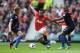 MANCHESTER, ENGLAND - SEPTEMBER 14: Anderson of Manchester United takes on Dwight Gayle (L) and Jason Puncheon of Crystal Palace (R) during the Barclays Premier League match between Manchester United and Crystal Palace at Old Trafford on September 14, 20