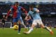 MANCHESTER, ENGLAND - DECEMBER 28: Adrian Mariappa of Crystal Palace competes with James Milner of Manchester City during the Barclays Premier League match between Manchester City and Crystal Palace at the Etihad Stadium on December 28, 2013 in Mancheste