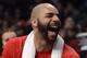 NEW YORK, NY - DECEMBER 25: Carlos Boozer #5 of the Chicago Bulls laughs as he sits on the bench during the fourth quarter against the Brooklyn Nets at the Barclays Center on December 25, 2013 in the Brooklyn borough of New York City. NOTE TO USER: User