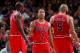 MILWAUKEE, WI - FEBRUARY 26: (L-R) Luol Deng #9, Derrick Rose #1 and Carlos Boozer #5 of the Chicago Bulls stand on the court during the game against the Milwaukee Bucks on February 26, 2011 at the Bradley Center in Milwaukee, Wisconsin. NOTE TO USER: