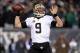 Jan 4, 2014; Philadelphia, PA, USA; New Orleans Saints quarterback Drew Brees (9) throws a pass against the Philadelphia Eagles during the second half of the 2013 NFC wild card playoff football game at Lincoln Financial Field. Mandatory Credit: Joe Campor