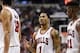 Nov 2, 2013; Philadelphia, PA, USA; Chicago Bulls guard Derrick Rose (1) talks with forward Luol Deng (9) center Joakim Noah (13) and guard Jimmy Butler (21) during the fourth quarter against the Philadelphia 76ers at Wells Fargo Center. The Sixers defeat