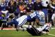 INDIANAPOLIS - JANUARY 21: Robert Mathis #98 of the Indianapolis Colts knocks down Tom Brady #12 of the New England Patriots during the AFC Championship Game on January 21, 2007 at the RCA Dome in Indianapolis, Indiana. (Photo by Doug Pensinger/Getty Im