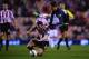 SUNDERLAND, ENGLAND - JANUARY 07: Adnan Januzaj of Manchester United is challenged by Phil Bardsley of Sunderland during the Capital One Cup Semi-Final, first leg match between Sunderland and Manchester United at Stadium of Light on January 7, 2014 in Su