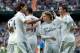 MADRID, SPAIN - NOVEMBER 09: Cristiano Ronaldo (R) of Real Madrid CF celebrates scoring their fifth goal with teammates Luka Modric (2ndR) and Sami Khedira (L) during the La Liga match between Real Madrid CF and Real Sociedad de Futbol at Estadio Santia