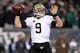 Jan 4, 2014; Philadelphia, PA, USA; New Orleans Saints quarterback Drew Brees (9) throws a pass against the Philadelphia Eagles during the second half of the 2013 NFC wild card playoff football game at Lincoln Financial Field. Mandatory Credit: Joe Campor