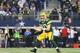ARLINGTON, TX - DECEMBER 15: Matt Flynn #10 of the Green Bay Packers celebrates a touchdown against the Dallas Cowboys in the fourth quarter at Cowboys Stadium on December 15, 2013 in Arlington, Texas. (Photo by Ronald Martinez/Getty Images)