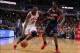 Jan 4, 2014; Chicago, IL, USA; Chicago Bulls small forward Luol Deng (9) drives against Atlanta Hawks small forward DeMarre Carroll (5) during the second half at the United Center. Chicago won 91-84. Mandatory Credit: Dennis Wierzbicki-USA TODAY Sports