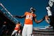 DENVER, CO - DECEMBER 2: Wide receiver Demaryius Thomas #88 of the Denver Broncos gives supporters high fives as he goes into the locker room after warming up before the game against the Tampa Bay Buccaneers at Sports Authority Field at Mile High on Decem