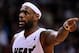 Jan 7, 2014; Miami, FL, USA; Miami Heat small forward LeBron James (6) reacts on the court against the New Orleans Pelicans during the second half at American Airlines Arena. The Heat won 107-88. Mandatory Credit: Steve Mitchell-USA TODAY Sports