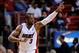 Jan 7, 2014; Miami, FL, USA; Miami Heat shooting guard Dwyane Wade (3) reacts from the court against the New Orleans Pelicans during the second half at American Airlines Arena. The Heat won 107-88. Mandatory Credit: Steve Mitchell-USA TODAY Sports