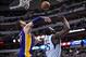 Jan 7, 2014; Dallas, TX, USA; Los Angeles Lakers center Pau Gasol (16) blocks a shot by Dallas Mavericks center DeJuan Blair (45) during the first quarter at the American Airlines Center. Mandatory Credit: Jerome Miron-USA TODAY Sports