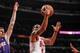 CHICAGO, IL - JANUARY 7: D.J. Augustin #14 of the Chicago Bulls shoots the ball past Goran Dragic #1 of the Phoenix Suns on January 07, 2013 at the United Center in Chicago, Illinois. NOTE TO USER: User expressly acknowledges and agrees that, by downloadi