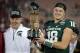 Jan 1, 2014; Pasadena, CA, USA; Michigan State Spartans coach Mark Dantonio (left) and quarterback Connor Cook (18) hoist the Leishman Trophy after the 100th Rose Bowl against the Stanford Cardinal. Michigan State defeated Stanford 24-20. Mandatory Credit