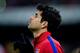 MADRID, SPAIN - DECEMBER 21: Diego Costa of Atletico de Madrid walks to the pitch prior to start the La Liga match between Club Atletico de Madrid and Levante UD at Vicente Calderon Stadium on December 21, 2013 in Madrid, Spain. (Photo by Gonzalo Arroyo