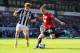 WEST BROMWICH, ENGLAND - MAY 19: Billy Jones of West Bromwich Albion watches Alexander Buttner of Manchester United during the Barclays Premier League match between West Bromwich Albion and Manchester United at The Hawthorns on May 19, 2013 in West Bromw