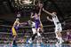 DALLAS, TX - JANUARY 7: Kendall Marshall #12 of the Los Angeles Lakers goes in for the lay up against Dirk Nowitzki #41 of the Dallas Mavericks on January 7, 2014 at the American Airlines Center in Dallas, Texas. NOTE TO USER: User expressly acknowledges