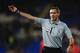 CARDIFF, WALES - DECEMBER 26: Referee Andre Marriner gives a decision during the Barclays Premier League match between Cardiff City and Southampton at Cardiff City Stadium on December 26, 2013 in Cardiff, Wales. (Photo by Richard Heathcote/Getty Images)