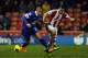 STOKE ON TRENT, ENGLAND - JANUARY 01: Erik Pieters of Stoke City in action with Ross Barkley of Everton during the Barclays Premier League match between Stoke City and Everton at Britannia Stadium on January 01, 2014 in Stoke on Trent, England. (Photo by