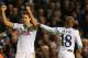 LONDON, ENGLAND - NOVEMBER 07: Erik Lamela of Spurs celebrates scoring their first goal with Jermain Defoe of Spurs during the UEFA Europa League Group K match between Tottenham Hotspur FC and FC Sheriff at White Hart Lane on November 7, 2013 in London,