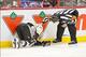 Dec 23, 2013; Ottawa, Ontario, CAN; Pittsburgh Penguins right wing Pascal Dupuis (9) is injured after colliding with center Sidney Crosby (87) in the first period against the Ottawa Senators at the Canadian Tire Centre. Mandatory Credit: Marc DesRosiers-U