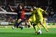 PAMPLONA, SPAIN - AUGUST 31: Jonathan Pereira (R) of Villarreal CF duels for the ball with Alejandro Arribas of CA Osasuna during the La Liga match between CA Osasuna and Villareal CF at El Sadar Stadium on August 31, 2013 in Pamplona, Spain. (Photo by