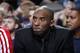 DALLAS, TX - JANUARY 7: Kobe Bryant #24 of the Los Angeles Lakers watches his team from the bench against the Dallas Mavericks on January 7, 2014 at the American Airlines Center in Dallas, Texas. NOTE TO USER: User expressly acknowledges and agrees that,