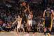 LOS ANGELES, CA - DECEMBER 31: Nick Young #0 of the Los Angeles Lakers attempts a shot against Khris Middleton #22 of the Milwaukee Bucks at STAPLES Center on December 31, 2013 in Los Angeles, California. NOTE TO USER: User expressly acknowledges and agre