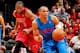MIAMI, FL - DECEMBER 25: Russell Westbrook #0 of the Oklahoma City Thunder drives on a fast break after stealing the ball from Dwyane Wade #3 of the Miami Heat during a Christmas Day game on December 25, 2012 at American Airlines Arena in Miami, Florida.