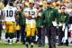 SAN DIEGO - NOVEMBER 6: Quarterback Aaron Rodgers #12 of the Green Bay Packers and Head Coach Mike McCarthy speak during the against the San Diego Chargers on November 6, 2011 at Qualcomm Stadium in San Diego, California. (Photo by Donald Miralle/Getty