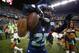 SEATTLE, WA - SEPTEMBER 15: Cornerback Richard Sherman #25 of the Seattle Seahawks celebrates after making an interception in the second half against the San Francisco 49ers at CenturyLink Field on September 15, 2013 in Seattle, Washington. (Photo by Ot