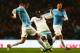 MANCHESTER, ENGLAND - JANUARY 08: Aleksandar Kolarov (L) of Manchester City tackles Mohamed Diame (R) of West Ham United during the Capital One Cup Semi-Final first leg match between Manchester City and West Ham United at at Etihad Stadium on January 8, 2