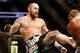 Aug 17, 2013; Boston, MA, USA; Travis Browne, left, battles Alistair Overeem during a UFC Heavyweight match at the TD Garden. Brown won by knockout in one round. Mandatory Credit: Winslow Townson-USA TODAY Sports