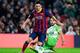 BARCELONA, SPAIN - JANUARY 08: Lionel Messi of FC Barcelona duels for the ball with Mehdi Lacen of Getafe CF during the Copa del Rey round of 16 first leg match between FC Barcelona and Getafe CF at Camp Nou on January 8, 2014 in Barcelona, Spain. (Phot