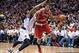 Dec 14, 2013; Dallas, TX, USA; Milwaukee Bucks shooting guard Giannis Antetokounmpo (34) drives to the basket past Dallas Mavericks shooting guard Wayne Ellington (21) during the game at the American Airlines Center. The Mavericks defeated the Bucks 106-9