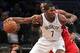Jan 6, 2014; Brooklyn, NY, USA; Brooklyn Nets shooting guard Joe Johnson (7) controls the ball against Atlanta Hawks small forward DeMarre Carroll (5) during the first quarter of a game at Barclays Center. Mandatory Credit: Brad Penner-USA TODAY Sports