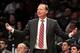 Jan 6, 2014; Brooklyn, NY, USA; Atlanta Hawks head coach Mike Budenholzer reacts during the fourth quarter of a game against the Brooklyn Nets at Barclays Center. The Nets defeated the Hawks 91-86. Mandatory Credit: Brad Penner-USA TODAY Sports