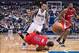Jan 3, 2014; Dallas, TX, USA; Los Angeles Clippers point guard Chris Paul (3) falls to the court while dribbling past Dallas Mavericks shooting guard Monta Ellis (11) during the second half at the American Airlines Center. Paul sprained his right shoulder