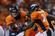 DENVER, CO - NOVEMBER 17: Peyton Manning #18 of the Denver Broncos hands the ball off to Knowshon Moreno #27 in the first half against the Kansas City Chiefs at Sports Authority Field at Mile High on November 17, 2013 in Denver, Colorado. (Photo by Ju
