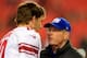 LANDOVER, MD - DECEMBER 01: Head coach Tom Coughlin of the New York Giants talks with Eli Manning #10 on the field prior to their game against the Washington Redskins at FedExField on December 1, 2013 in Landover, Maryland. (Photo by Rob Carr/Getty Imag
