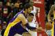 HOUSTON, TX - JANUARY 8: Pau Gasol #16 of the Los Angeles Lakers works the ball against Jeremy Lin #7 of the Houston Rockets during the game at the Toyota Center on January 8, 2014 in Houston, Texas. NOTE TO USER: User expressly acknowledges and agrees t