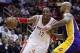 Jan 8, 2014; Houston, TX, USA; Houston Rockets power forward Dwight Howard (12) drives to the basket against Los Angeles Lakers center Robert Sacre (50) during the second quarter at Toyota Center. Mandatory Credit: Andrew Richardson-USA TODAY Sports