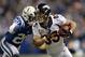 Oct 20, 2013; Indianapolis, IN, USA; Denver Broncos wide receiver Wes Welker (83) is tackled by Indianapolis Colts free safety Darius Butler (20) after a catch in the fourth quarter at Lucas Oil Stadium. The Colts defeated the Broncos 39-33. Mandatory Cre