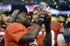 Dec 1, 2012; Indianapolis, IN, USA; Wisconsin Badgers running back Montee Ball holds up the Big Ten championship trophy after defeating the Nebraska Cornhuskers in the Big Ten championship game at Lucas Oil Stadium. Mandatory Credit: Richard Mackson-USA