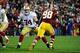 Nov 25, 2013; Landover, MD, USA; San Francisco 49ers offensive tackle Joe Staley (74) prepares to block Washington Redskins linebacker Brian Orakpo (98) during the first half at FedEx Field. Mandatory Credit: Brad Mills-USA TODAY Sports