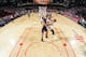 HOUSTON, TX - JANUARY 8: Jeremy Lin #7 of the Houston Rockets shoots against Kendall Marshall #12 of the Los Angeles Lakers on January 8, 2014 at the Toyota Center in Houston, Texas. NOTE TO USER: User expressly acknowledges and agrees that, by downloadi
