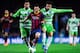 BARCELONA, SPAIN - JANUARY 08: Lionel Messi of FC Barcelona duels for the ball with Juan Rodriguez (L) and Pedro Leon of Getafe CF during the Copa del Rey round of 16 first leg match between FC Barcelona and Getafe CF at Camp Nou on January 8, 2014 in Ba